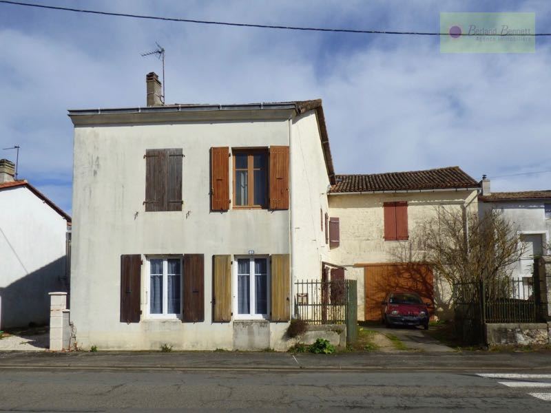 Maison en pierres proche commerces