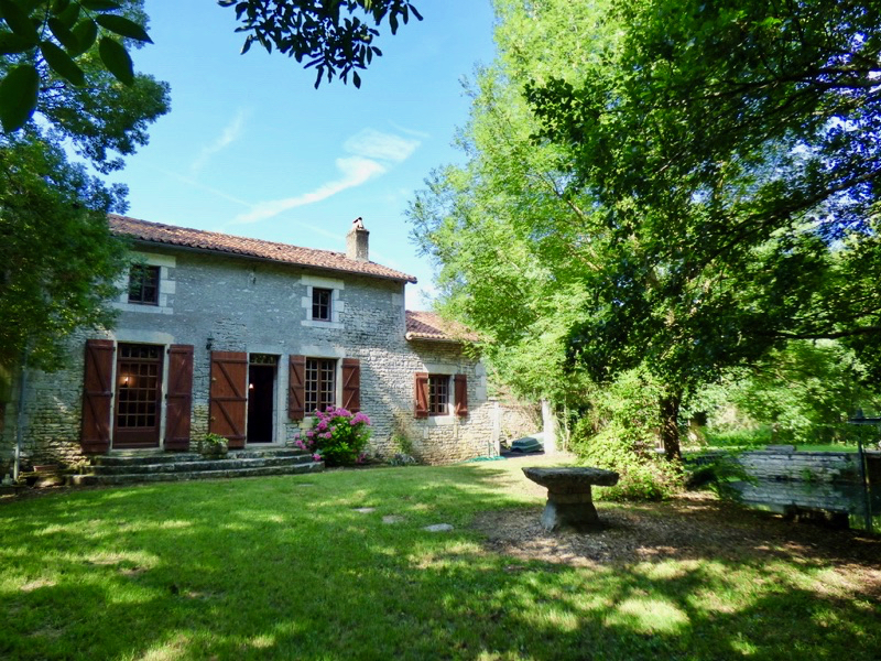 Ancien moulin dans environnement exceptionnel