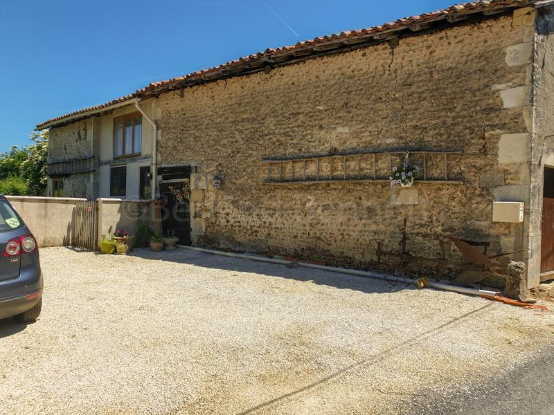 Lots of further potential for this stone house + barns