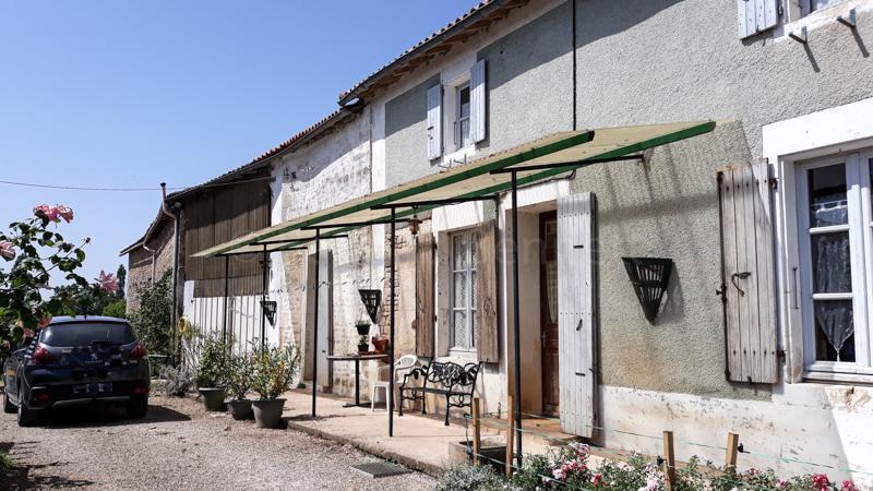 Maison en pierres + terrain à bâtir