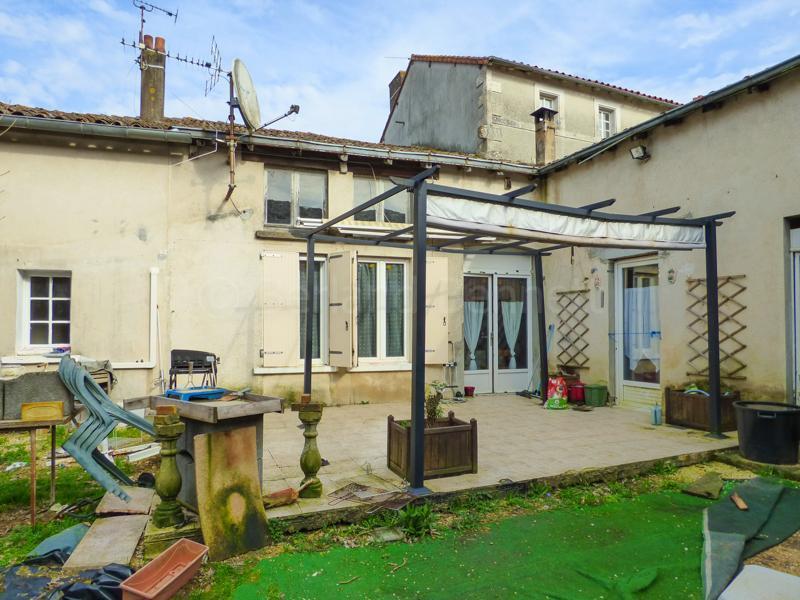 Large stone town house with courtyard garden