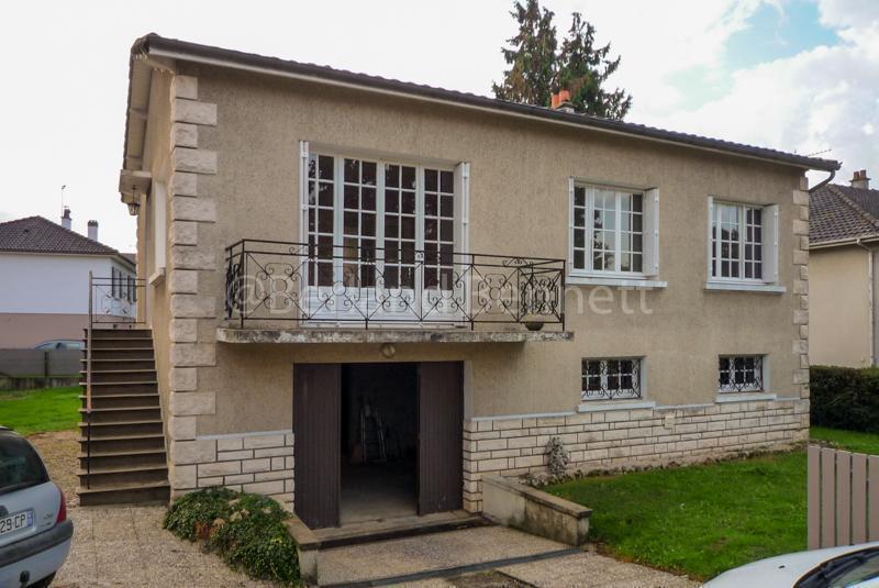 Maison avec garage et jardin proche tous commerces