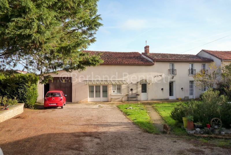 Spacious stone house with outbuildings and enclosed garden