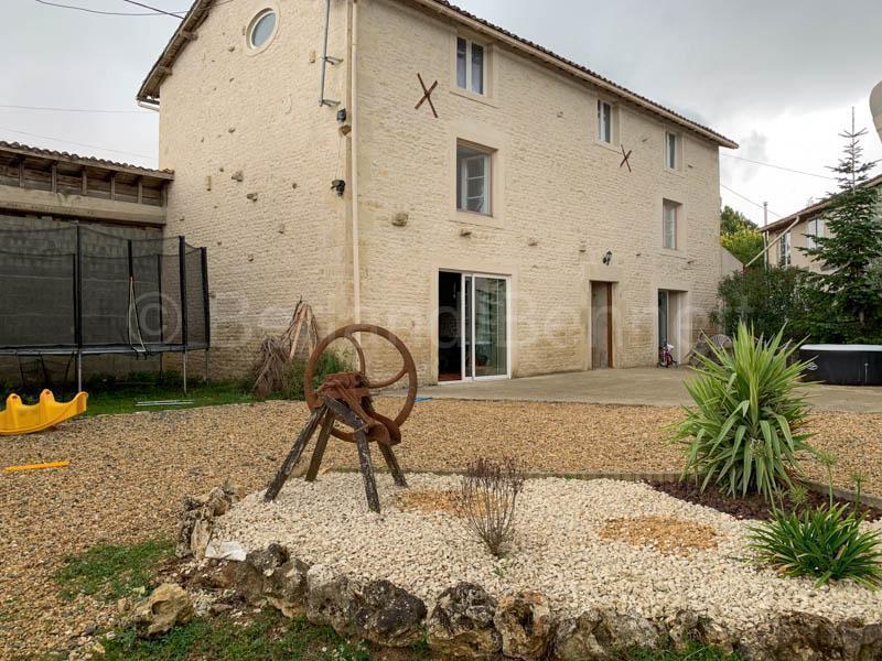 Renovated stone house with outbuildings