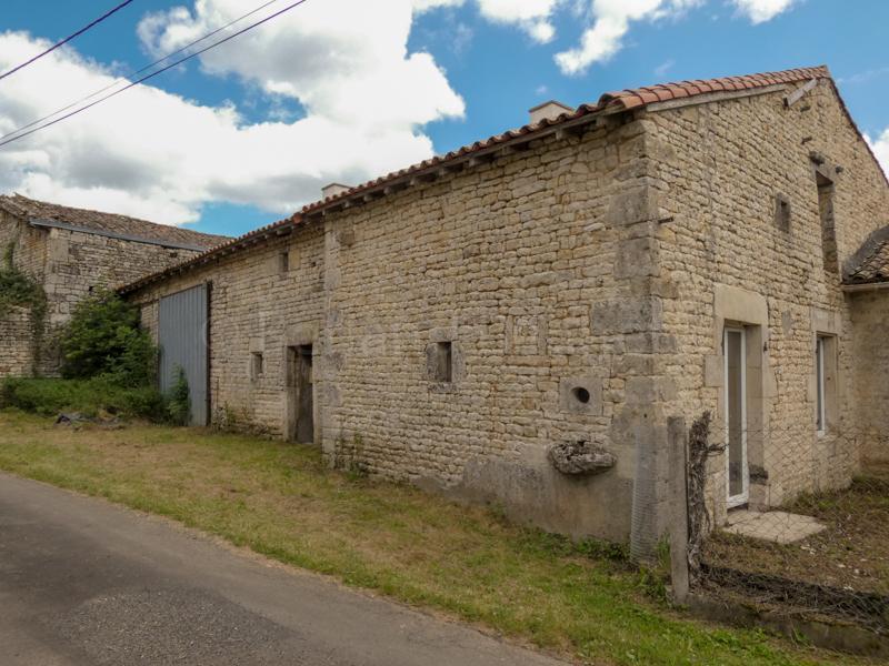 Stone house to renovate with outbuildings