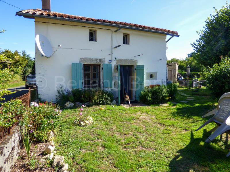 Pretty detached stone cottage with large garden