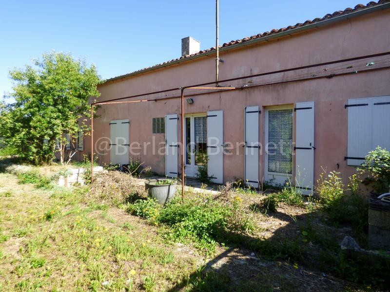 Detached stone house with courtyard garden