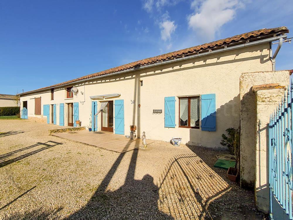 Traditional detached stone house with outbuildings