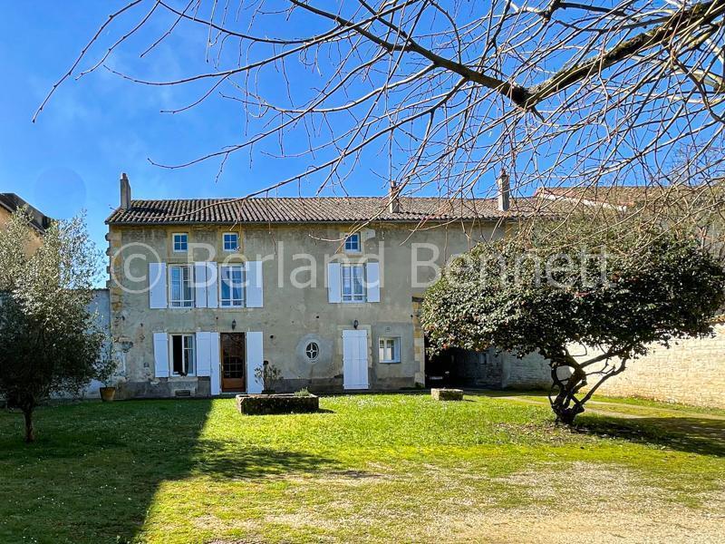 Large stone townhouse with studio, outbuilding and land