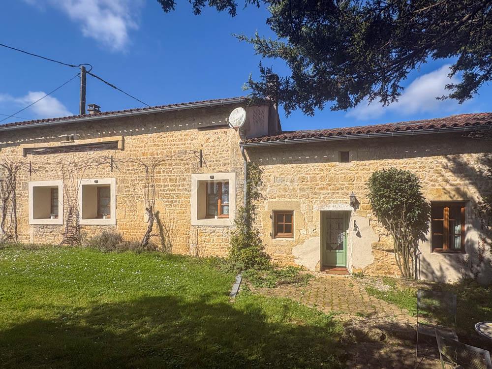 Well renovated stone house with garage and open rear views