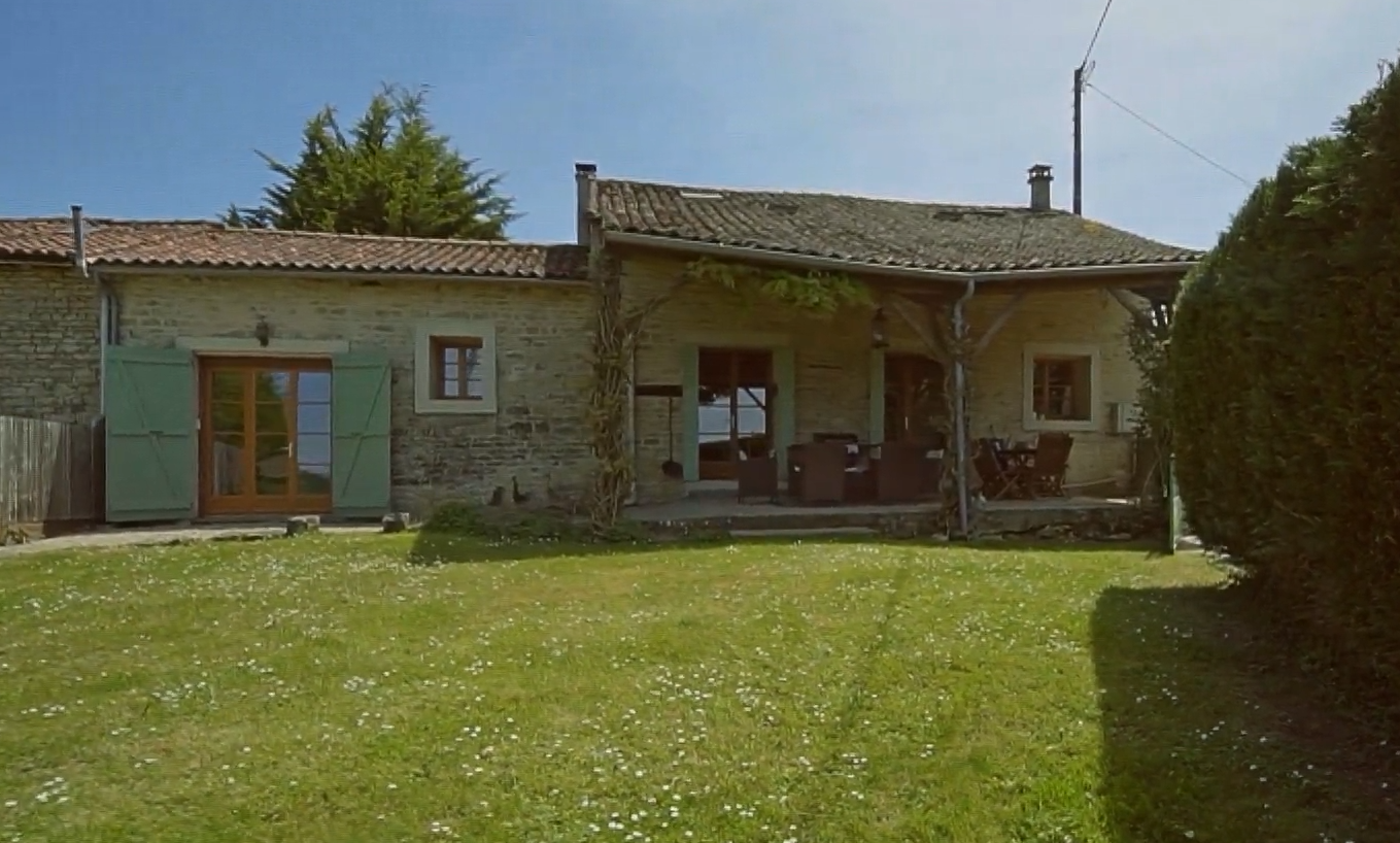 Well renovated stone house with garage and open rear views