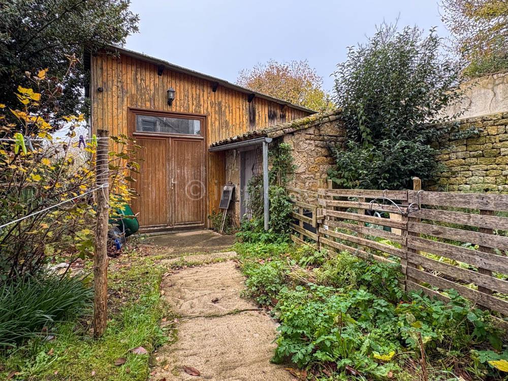 Belle maison bourgeoise avec garage et jardin